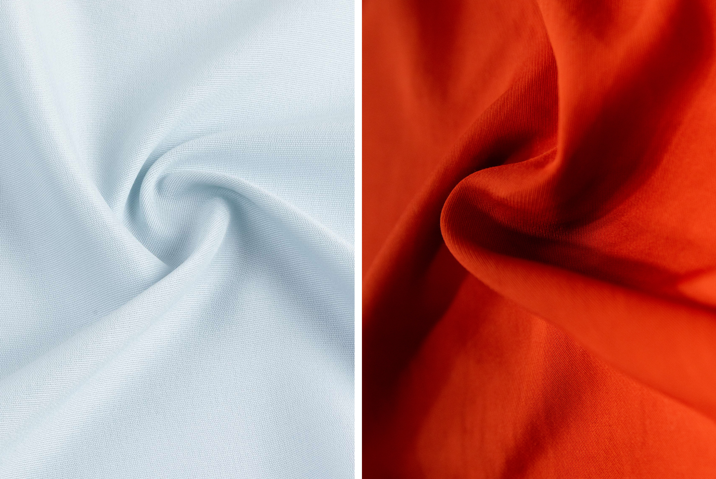 A rust white fabric twisted at the center.