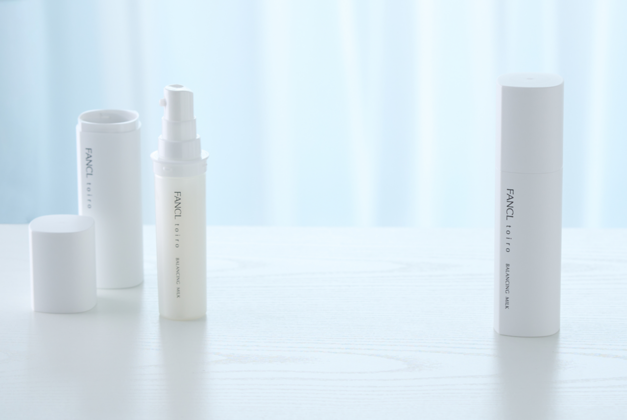 Two FANCL balancing milk bottles, showcasing how the product cartridge can be removed. 